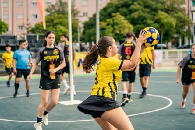 A player shoots on an outdoor court in Lisbon