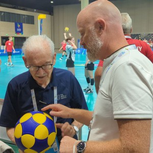 Ron Froehlich gets hands-on with a korfball ball with Gabi Kool, Executive Vice President of the IKF