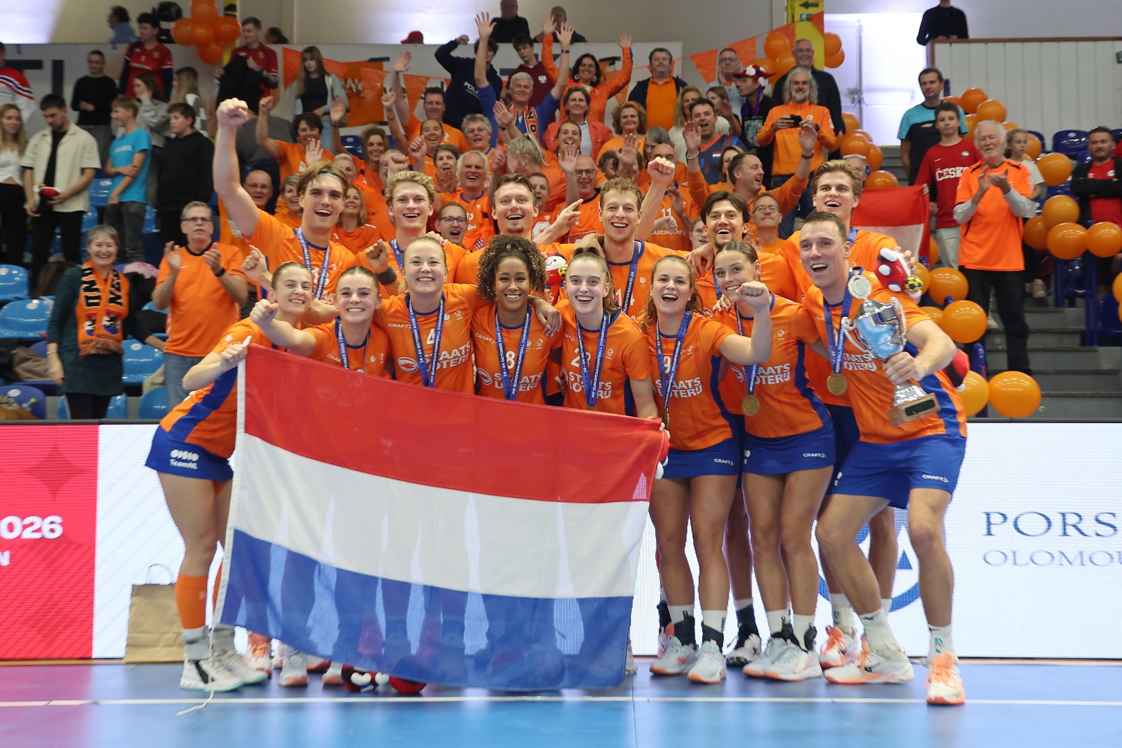 the victorious Dutch team with their support