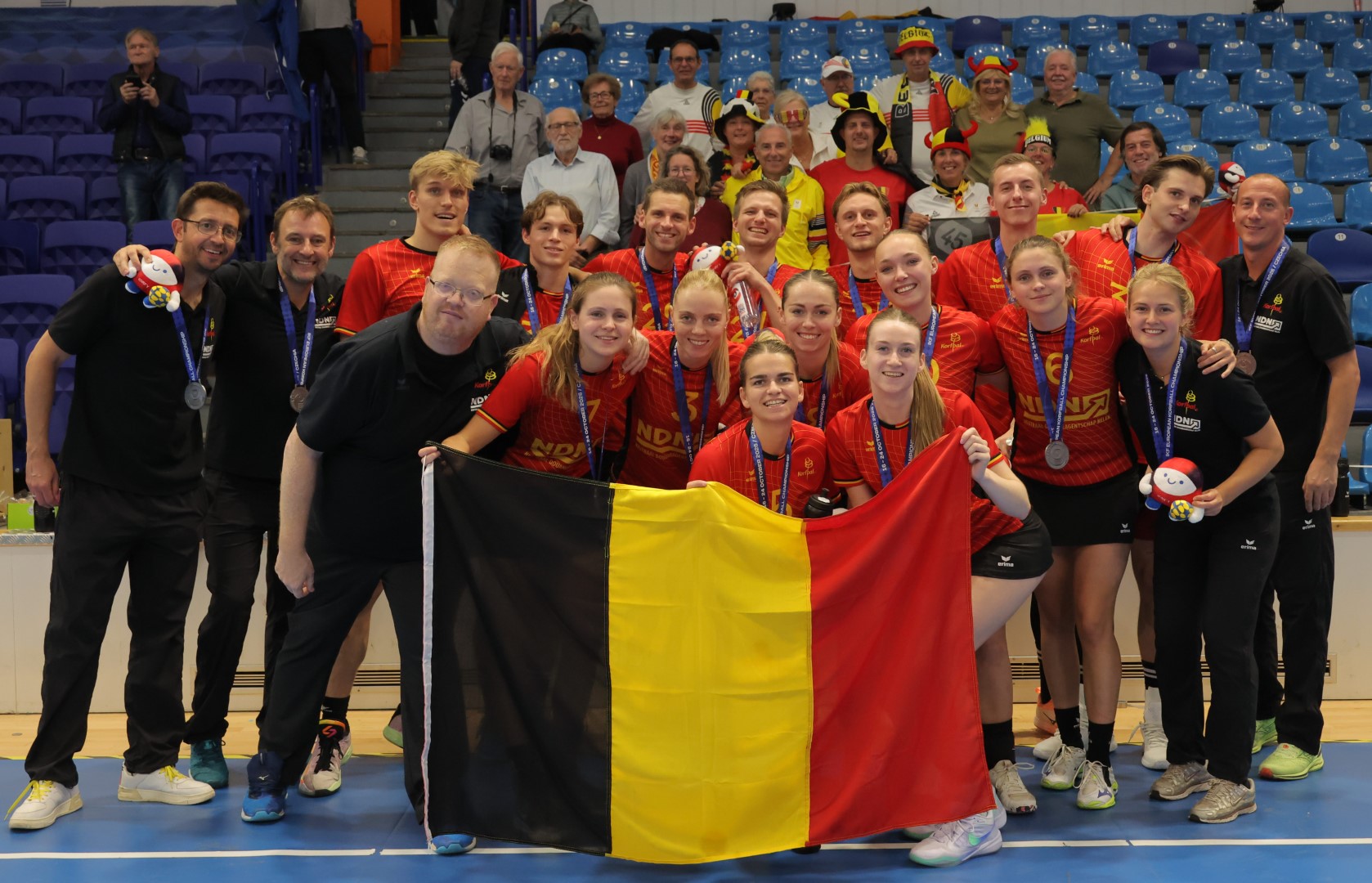 The Belgian team with their support
